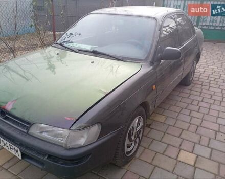 Сірий Тойота Королла, об'ємом двигуна 1.33 л та пробігом 299 тис. км за 1100 $, фото 1 на Automoto.ua