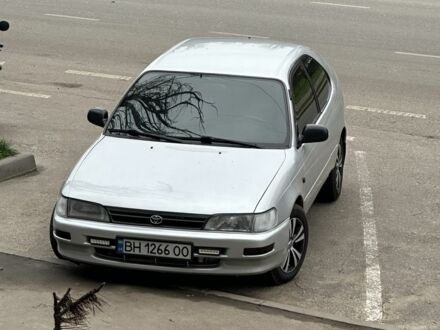 Серый Тойота Королла, объемом двигателя 1.3 л и пробегом 300 тыс. км за 3200 $, фото 1 на Automoto.ua