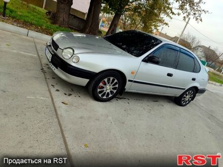 Серый Тойота Королла, объемом двигателя 2 л и пробегом 240 тыс. км за 2850 $, фото 1 на Automoto.ua