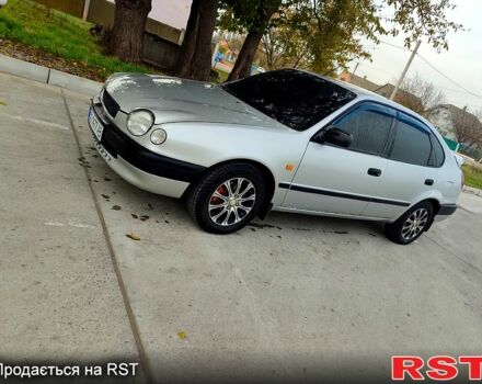 Серый Тойота Королла, объемом двигателя 2 л и пробегом 240 тыс. км за 2850 $, фото 1 на Automoto.ua