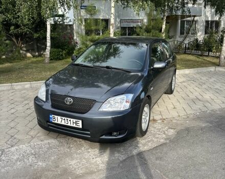 Сірий Тойота Королла, об'ємом двигуна 2 л та пробігом 299 тис. км за 4899 $, фото 1 на Automoto.ua