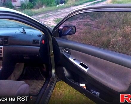 Серый Тойота Королла, объемом двигателя 2 л и пробегом 330 тыс. км за 4200 $, фото 1 на Automoto.ua