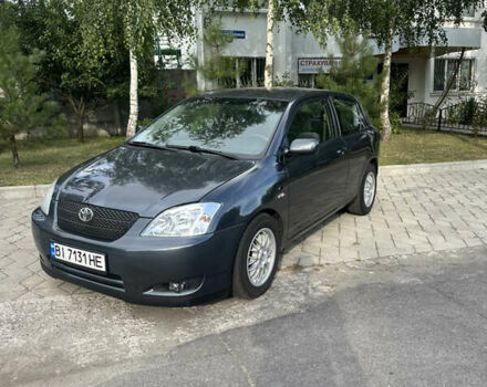 Сірий Тойота Королла, об'ємом двигуна 2 л та пробігом 299 тис. км за 4899 $, фото 1 на Automoto.ua