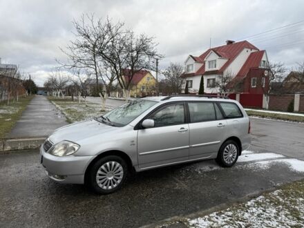 Сірий Тойота Королла, об'ємом двигуна 2 л та пробігом 300 тис. км за 1799 $, фото 1 на Automoto.ua