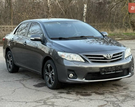 Сірий Тойота Королла, об'ємом двигуна 1.6 л та пробігом 83 тис. км за 10700 $, фото 1 на Automoto.ua