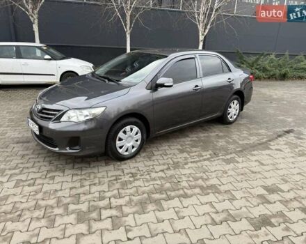 Сірий Тойота Королла, об'ємом двигуна 1.33 л та пробігом 235 тис. км за 7850 $, фото 1 на Automoto.ua