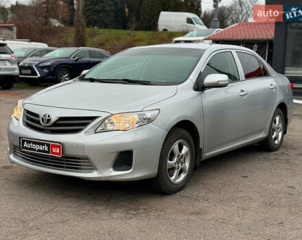 Сірий Тойота Королла, об'ємом двигуна 1.3 л та пробігом 137 тис. км за 7490 $, фото 1 на Automoto.ua