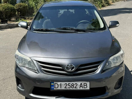 Серый Тойота Королла, объемом двигателя 1.33 л и пробегом 258 тыс. км за 4700 $, фото 1 на Automoto.ua