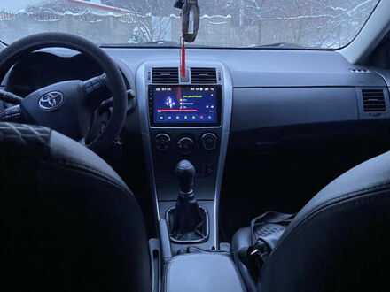 Сірий Тойота Королла, об'ємом двигуна 1.33 л та пробігом 130 тис. км за 9500 $, фото 1 на Automoto.ua