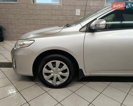 Сірий Тойота Королла, об'ємом двигуна 1.33 л та пробігом 147 тис. км за 9000 $, фото 1 на Automoto.ua