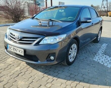 Сірий Тойота Королла, об'ємом двигуна 1.6 л та пробігом 242 тис. км за 8000 $, фото 1 на Automoto.ua