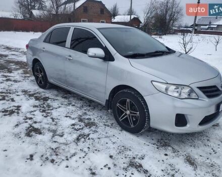 Сірий Тойота Королла, об'ємом двигуна 1.3 л та пробігом 203 тис. км за 6800 $, фото 1 на Automoto.ua