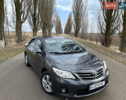 Серый Тойота Королла, объемом двигателя 1.6 л и пробегом 165 тыс. км за 9300 $, фото 1 на Automoto.ua