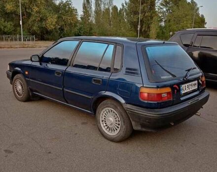 Синий Тойота Королла, объемом двигателя 1.3 л и пробегом 303 тыс. км за 2000 $, фото 2 на Automoto.ua