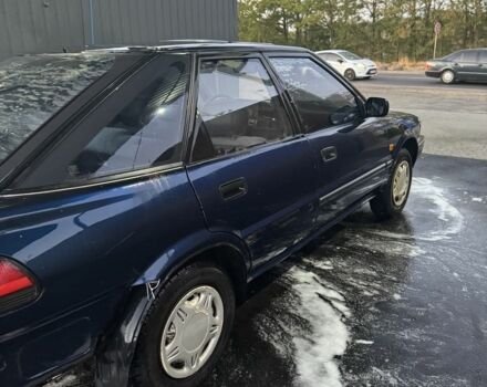 Синий Тойота Королла, объемом двигателя 1.3 л и пробегом 400 тыс. км за 900 $, фото 7 на Automoto.ua