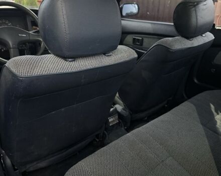 Синий Тойота Королла, объемом двигателя 1.3 л и пробегом 400 тыс. км за 900 $, фото 5 на Automoto.ua