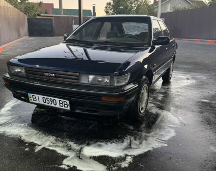 Синий Тойота Королла, объемом двигателя 1.3 л и пробегом 400 тыс. км за 900 $, фото 1 на Automoto.ua