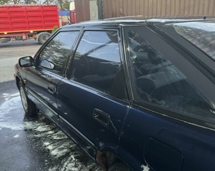 Синий Тойота Королла, объемом двигателя 1.3 л и пробегом 400 тыс. км за 900 $, фото 3 на Automoto.ua