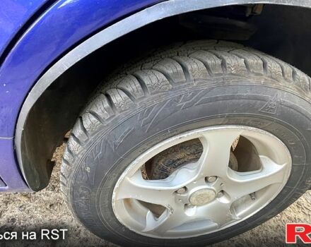 Синий Тойота Королла, объемом двигателя 1.3 л и пробегом 250 тыс. км за 1750 $, фото 4 на Automoto.ua