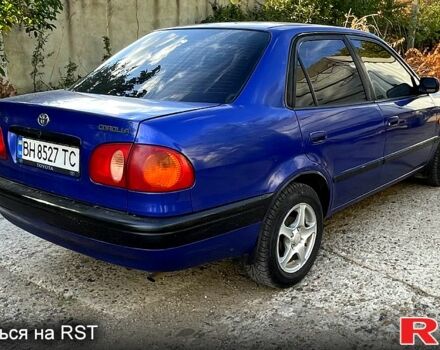 Синий Тойота Королла, объемом двигателя 1.3 л и пробегом 250 тыс. км за 1750 $, фото 1 на Automoto.ua