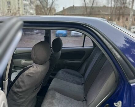 Синий Тойота Королла, объемом двигателя 1.4 л и пробегом 300 тыс. км за 1999 $, фото 9 на Automoto.ua