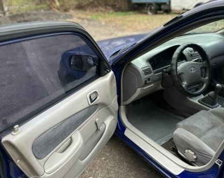 Синий Тойота Королла, объемом двигателя 1.4 л и пробегом 300 тыс. км за 1999 $, фото 4 на Automoto.ua