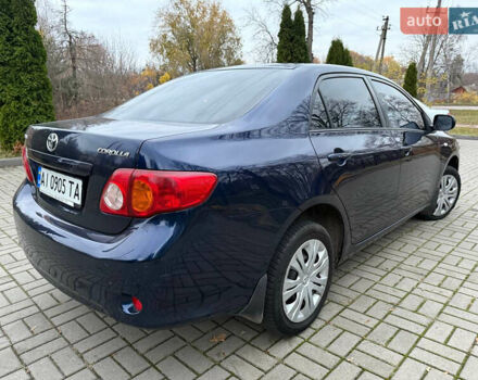 Синій Тойота Королла, об'ємом двигуна 1.6 л та пробігом 275 тис. км за 6000 $, фото 4 на Automoto.ua