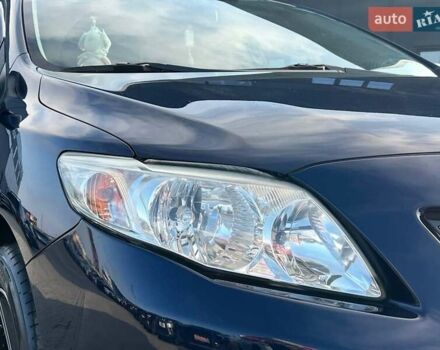 Синій Тойота Королла, об'ємом двигуна 1.6 л та пробігом 198 тис. км за 8690 $, фото 11 на Automoto.ua