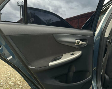 Синій Тойота Королла, об'ємом двигуна 1.6 л та пробігом 239 тис. км за 6900 $, фото 21 на Automoto.ua