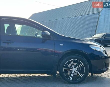 Синій Тойота Королла, об'ємом двигуна 1.6 л та пробігом 198 тис. км за 8690 $, фото 9 на Automoto.ua