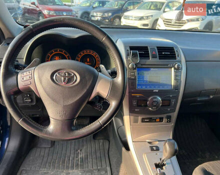 Синій Тойота Королла, об'ємом двигуна 1.6 л та пробігом 198 тис. км за 8690 $, фото 21 на Automoto.ua