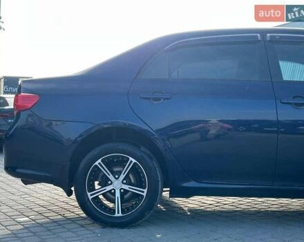 Синій Тойота Королла, об'ємом двигуна 1.6 л та пробігом 198 тис. км за 8690 $, фото 8 на Automoto.ua