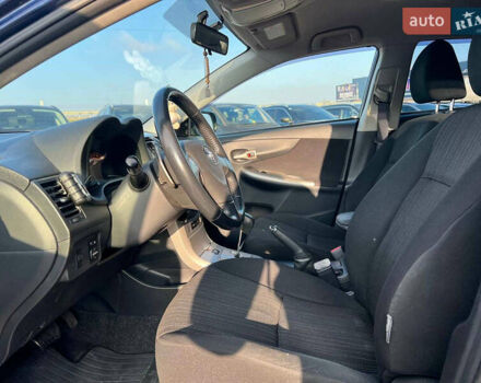 Синій Тойота Королла, об'ємом двигуна 1.6 л та пробігом 198 тис. км за 8690 $, фото 17 на Automoto.ua