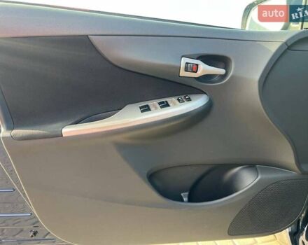 Синій Тойота Королла, об'ємом двигуна 1.6 л та пробігом 198 тис. км за 8690 $, фото 13 на Automoto.ua