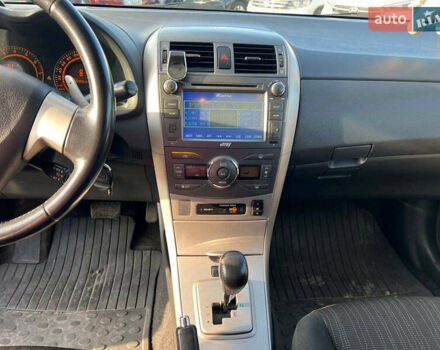Синій Тойота Королла, об'ємом двигуна 1.6 л та пробігом 198 тис. км за 8690 $, фото 26 на Automoto.ua