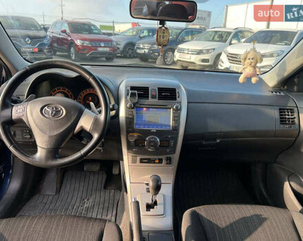 Синій Тойота Королла, об'ємом двигуна 1.6 л та пробігом 198 тис. км за 8690 $, фото 35 на Automoto.ua