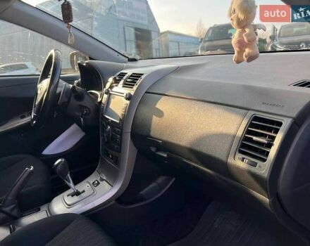 Синій Тойота Королла, об'ємом двигуна 1.6 л та пробігом 198 тис. км за 8690 $, фото 37 на Automoto.ua