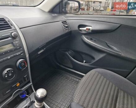 Синий Тойота Королла, объемом двигателя 1.3 л и пробегом 160 тыс. км за 7499 $, фото 22 на Automoto.ua