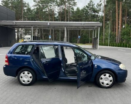 Синій Тойота Королла, об'ємом двигуна 2 л та пробігом 427 тис. км за 4000 $, фото 3 на Automoto.ua