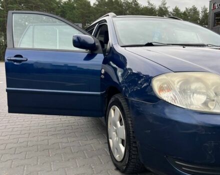 Синій Тойота Королла, об'ємом двигуна 2 л та пробігом 427 тис. км за 4000 $, фото 2 на Automoto.ua