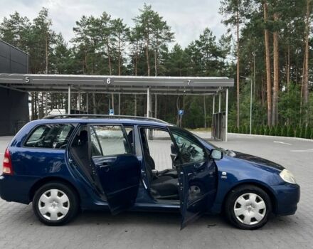 Синій Тойота Королла, об'ємом двигуна 2 л та пробігом 427 тис. км за 4000 $, фото 8 на Automoto.ua