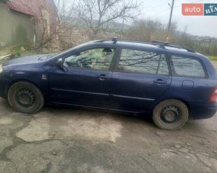 Синій Тойота Королла, об'ємом двигуна 2 л та пробігом 410 тис. км за 3600 $, фото 2 на Automoto.ua