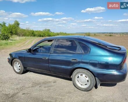 Синий Тойота Королла, объемом двигателя 2 л и пробегом 320 тыс. км за 2000 $, фото 11 на Automoto.ua