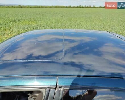 Синий Тойота Королла, объемом двигателя 2 л и пробегом 320 тыс. км за 2000 $, фото 2 на Automoto.ua