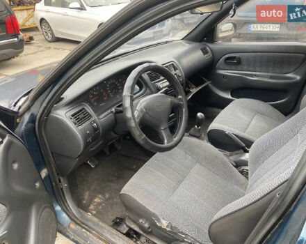 Синий Тойота Королла, объемом двигателя 1.3 л и пробегом 260 тыс. км за 1625 $, фото 3 на Automoto.ua