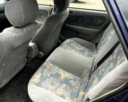 Синий Тойота Королла, объемом двигателя 1.3 л и пробегом 355 тыс. км за 2700 $, фото 5 на Automoto.ua