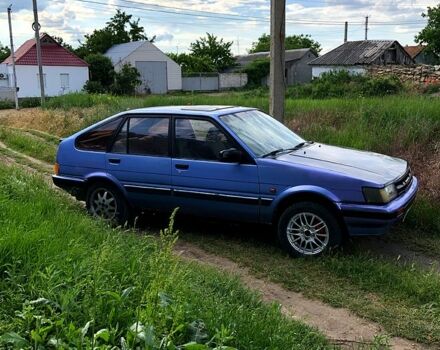 Синий Тойота Королла, объемом двигателя 1.3 л и пробегом 200 тыс. км за 900 $, фото 1 на Automoto.ua