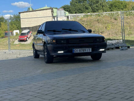 Синий Тойота Королла, объемом двигателя 1.3 л и пробегом 256 тыс. км за 472 $, фото 1 на Automoto.ua