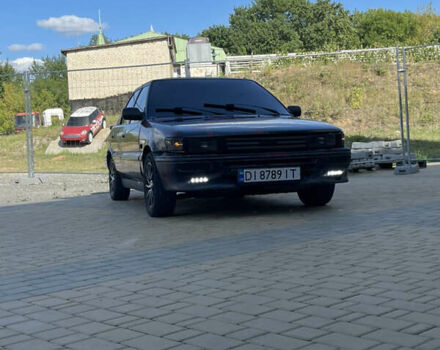 Синий Тойота Королла, объемом двигателя 1.3 л и пробегом 256 тыс. км за 472 $, фото 1 на Automoto.ua