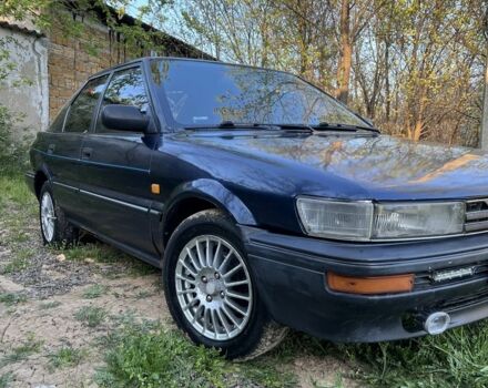 Синий Тойота Королла, объемом двигателя 1.3 л и пробегом 300 тыс. км за 950 $, фото 1 на Automoto.ua